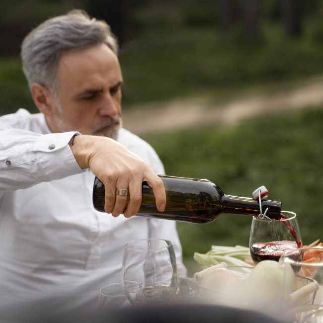 medium-shot-man-pouring-wine